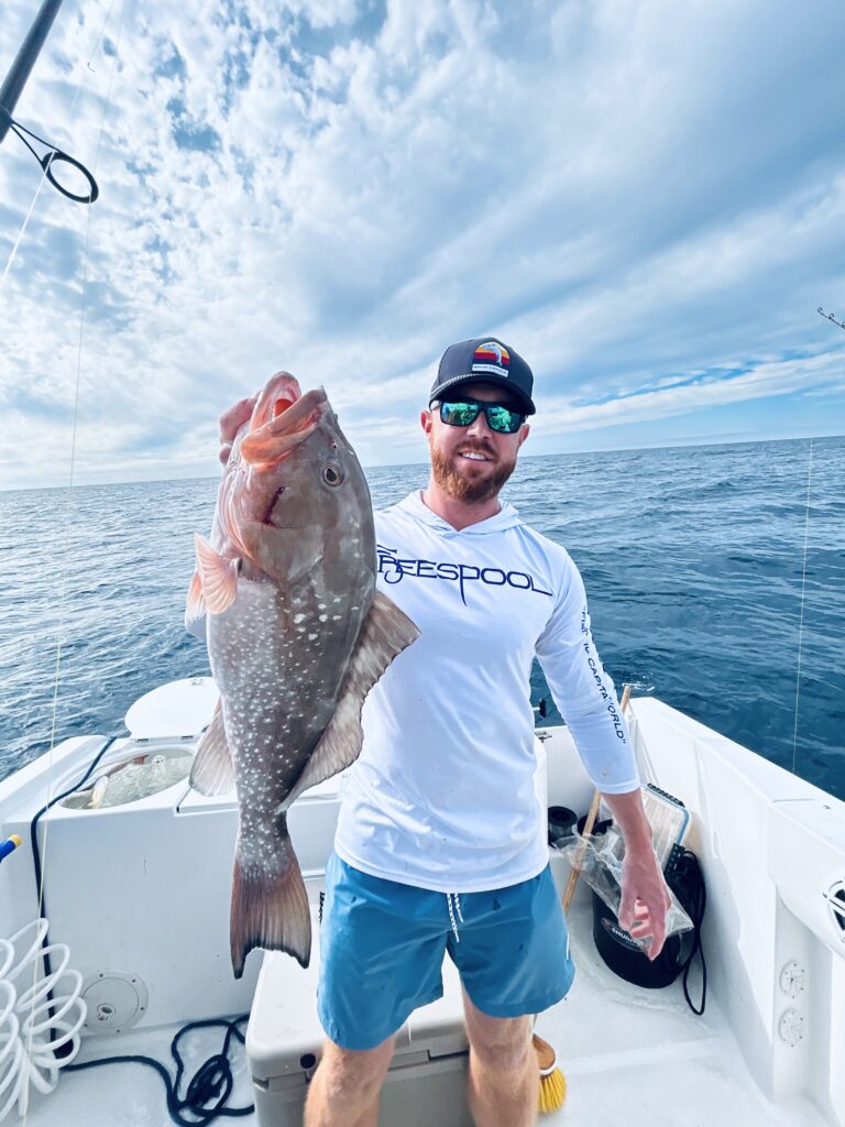 Captain Aaron of Triple G's Rentals, a Florida-grown fishing guide and boat captain offering expert marine life tours around Anna Maria Island and Siesta Key.
